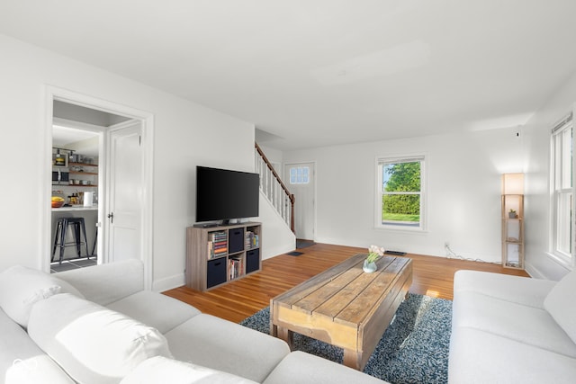 2336 Sycamore St, Columbus, IN 47201 - living room featuring stairway and wood finished floors
