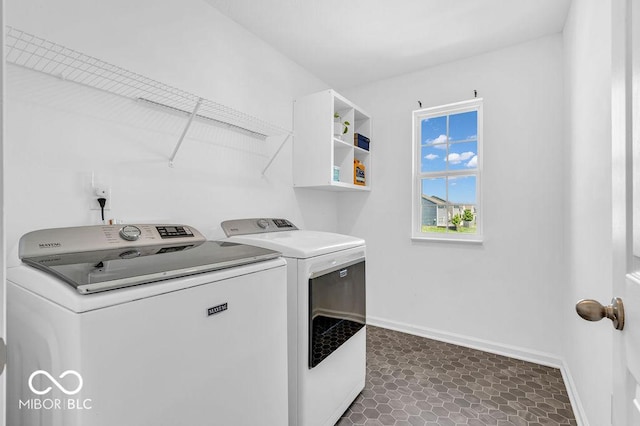 5256 Bramwell Ln, Whitestown, IN 46075 - laundry room with separate washer and dryer and baseboards