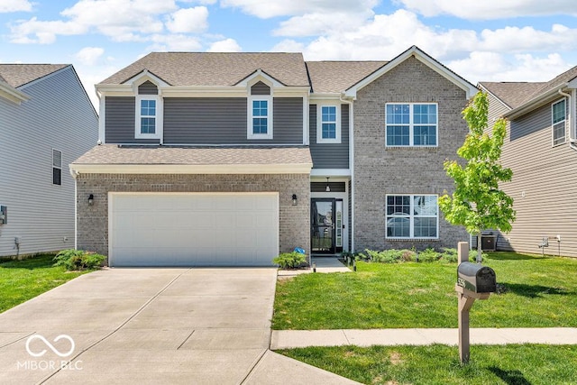 5256 Bramwell Ln, Whitestown, IN 46075 - view of front of home with concrete driveway, a front lawn, an attached garage, and brick siding