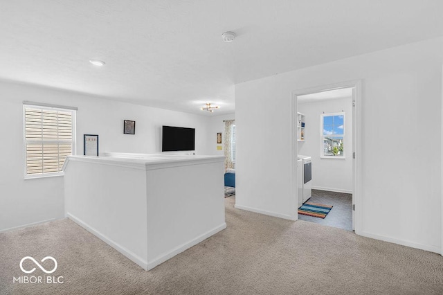 5256 Bramwell Ln, Whitestown, IN 46075 - interior space with washer and dryer, carpet flooring, baseboards, and a smoke detector