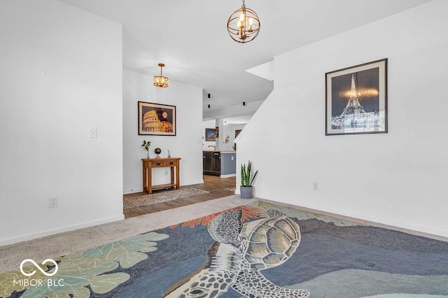 5256 Bramwell Ln, Whitestown, IN 46075 - carpeted foyer featuring a chandelier and baseboards