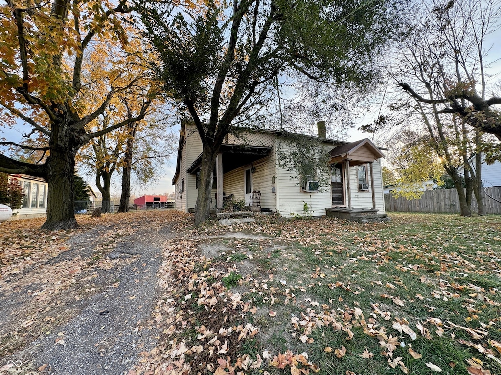 8345 N State Road 109, Wilkinson, IN 46186 - bungalow-style home with fence