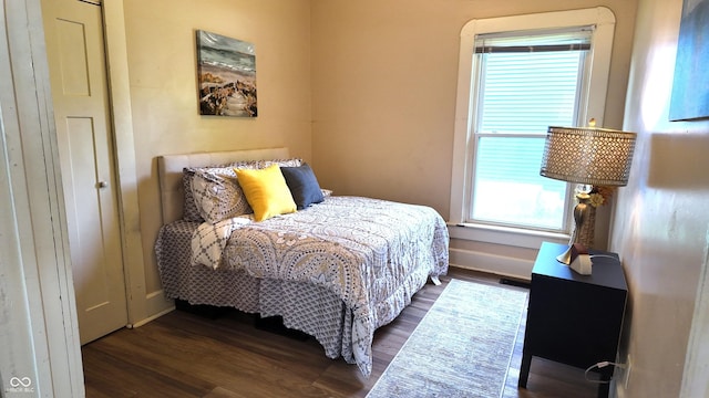 1148 N Pershing Ave, Indianapolis, IN 46222 - bedroom with dark wood finished floors and baseboards