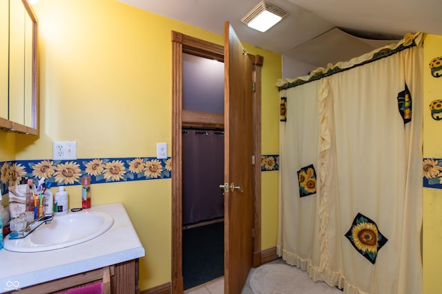 7730 Bear Creek Rd, Morgantown, IN 46160 - full bath featuring vanity, lofted ceiling, baseboards, and a shower with curtain