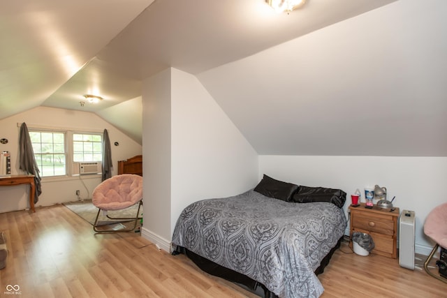 7730 Bear Creek Rd, Morgantown, IN 46160 - bedroom with light wood-style flooring, lofted ceiling, and cooling unit