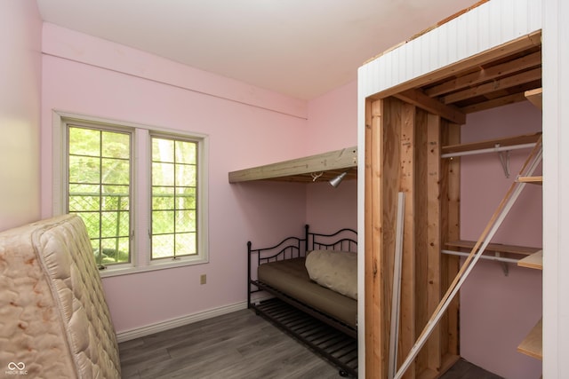 7730 Bear Creek Rd, Morgantown, IN 46160 - bedroom featuring multiple windows, wood finished floors, and baseboards