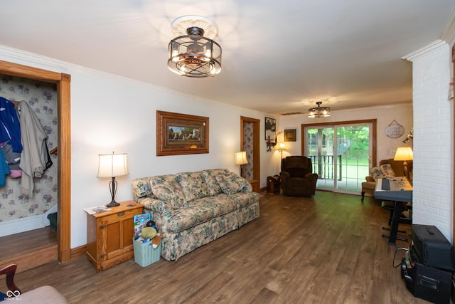 7730 Bear Creek Rd, Morgantown, IN 46160 - living area featuring baseboards, wood finished floors, crown molding, and ornate columns