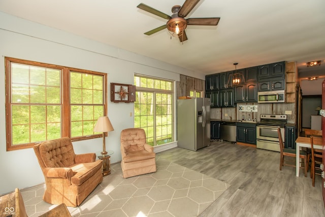 7730 Bear Creek Rd, Morgantown, IN 46160 - living area with ceiling fan and light wood finished floors