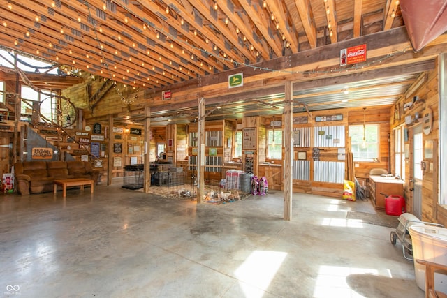 7730 Bear Creek Rd, Morgantown, IN 46160 - misc room with concrete flooring and wood walls