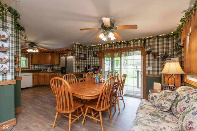7730 Bear Creek Rd, Morgantown, IN 46160 - dining space featuring a ceiling fan, wallpapered walls, and wood finished floors