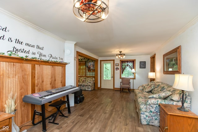 7730 Bear Creek Rd, Morgantown, IN 46160 - living room featuring a chandelier, wood finished floors, ornamental molding, and baseboards