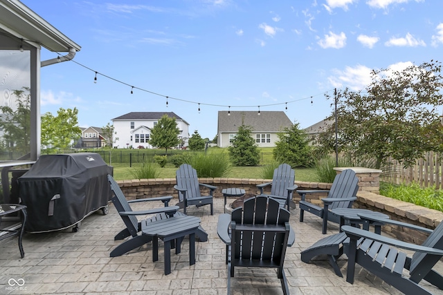 952 Workington Cir, Westfield, IN 46074 - fenced backyard featuring a patio area, a fire pit, and grilling area