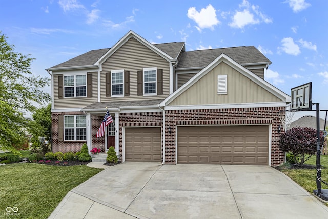 952 Workington Cir, Westfield, IN 46074 - traditional-style home featuring driveway, a front lawn, and brick siding
