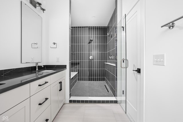 525 Fynn Pl, Indianapolis, IN 46202 - bathroom with a stall shower, vanity, and tile patterned floors