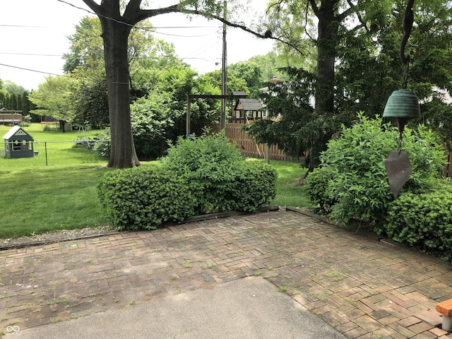 3619 31st St, Columbus, IN 47203 - view of patio with a playground