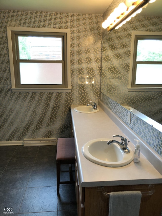3619 31st St, Columbus, IN 47203 - bathroom featuring healthy amount of natural light, double vanity, and tile patterned flooring