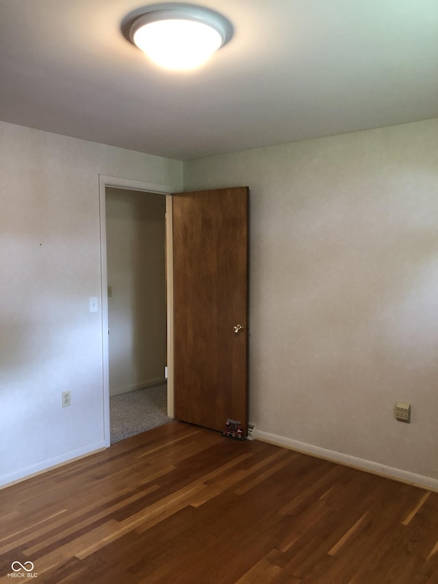3619 31st St, Columbus, IN 47203 - empty room featuring baseboards and wood finished floors