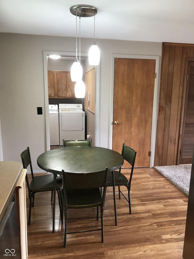 3619 31st St, Columbus, IN 47203 - dining space featuring washer and clothes dryer and light wood finished floors