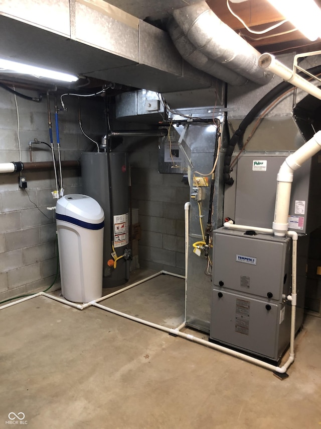 3619 31st St, Columbus, IN 47203 - utility room featuring water heater and heating unit