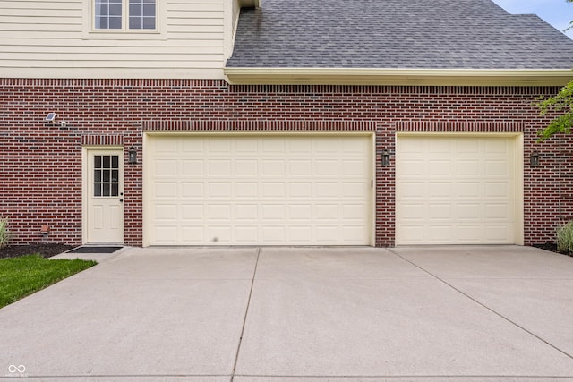 garage with driveway