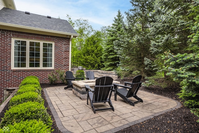 view of patio / terrace with a fire pit