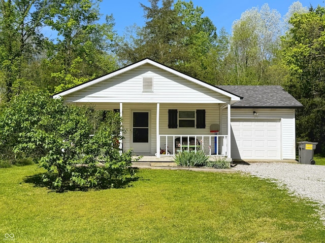 ranch-style home with a porch, a garage, a front lawn, driveway, and a shingled roof