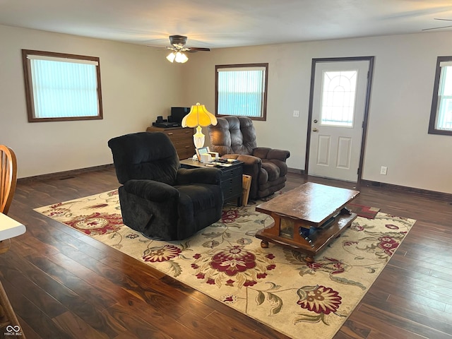 1216 N Cherry St, Rushville, IN 46173 - living area with healthy amount of natural light, ceiling fan, hardwood / wood-style floors, and baseboards