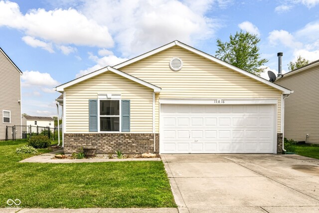 ranch-style home featuring brick siding, driveway, and an attached garage