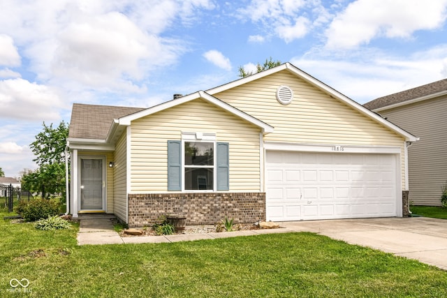 view of front of home with brick siding, driveway, an attached garage, and a front lawn