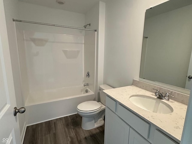 6712 Rawlings Ln, Indianapolis, IN 46221 - full bath with wood finished floors, vanity, and shower / bathtub combination