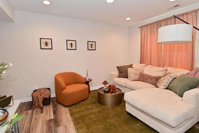 3110 W New York St, Indianapolis, IN 46222 - living area featuring wood finished floors, recessed lighting, and baseboards