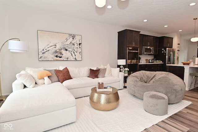 3110 W New York St, Indianapolis, IN 46222 - living area with wood finished floors, recessed lighting, and a ceiling fan