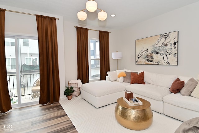 3110 W New York St, Indianapolis, IN 46222 - living room with wood finished floors, recessed lighting, and a chandelier