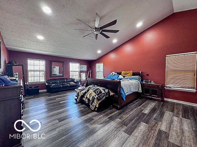 6155 W Bayfront, Mccordsville, IN 46055 - bedroom featuring vaulted ceiling, wood finished floors, a textured ceiling, recessed lighting, and ceiling fan