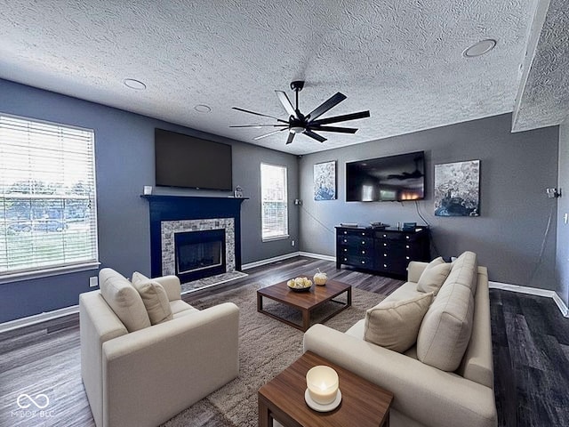 6155 W Bayfront, Mccordsville, IN 46055 - living area with baseboards, a textured ceiling, ceiling fan, wood finished floors, and healthy amount of natural light