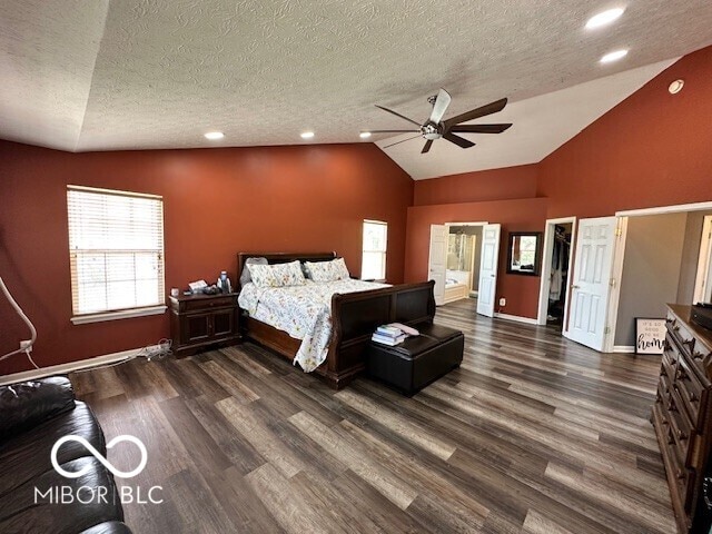 6155 W Bayfront, Mccordsville, IN 46055 - bedroom with a textured ceiling, dark wood-style flooring, lofted ceiling, a spacious closet, and recessed lighting