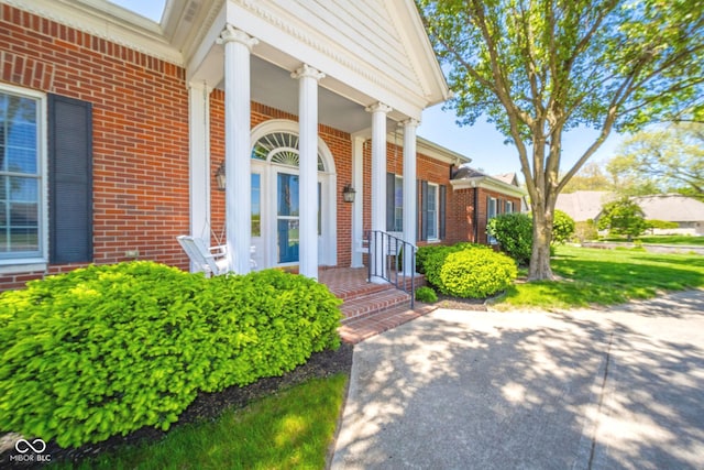 1105 Deer Creek Dr, Anderson, IN 46011 - property entrance with brick siding and a porch