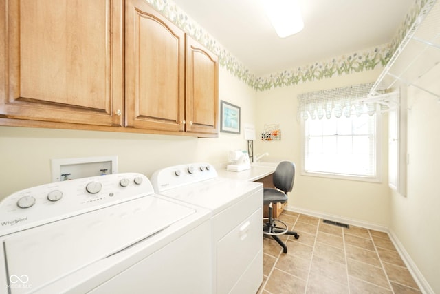 1105 Deer Creek Dr, Anderson, IN 46011 - clothes washing area with cabinet space, washing machine and dryer, baseboards, an office area, and light tile patterned floors
