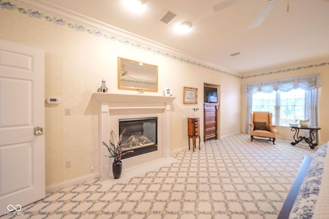 1105 Deer Creek Dr, Anderson, IN 46011 - carpeted living area with crown molding, a glass covered fireplace, and baseboards