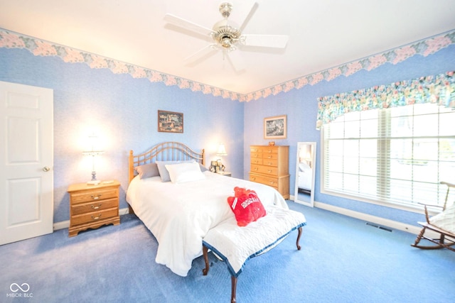 1105 Deer Creek Dr, Anderson, IN 46011 - bedroom with carpet flooring, baseboards, and ceiling fan