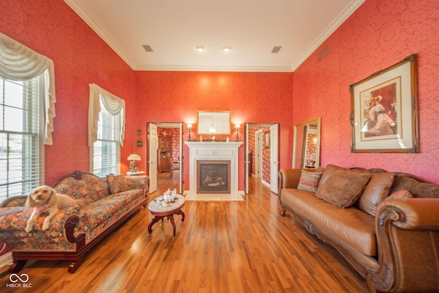 1105 Deer Creek Dr, Anderson, IN 46011 - living room with ornamental molding, wood finished floors, and a fireplace with flush hearth