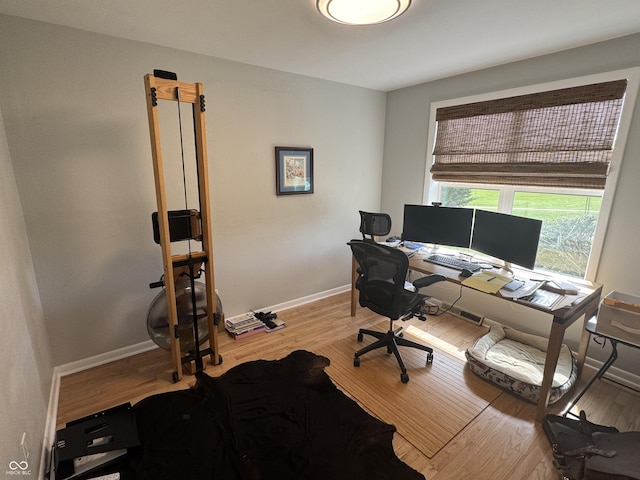 3641 S Rogers St, Bloomington, IN 47403 - office featuring wood finished floors and baseboards