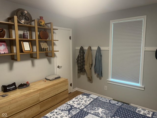 3641 S Rogers St, Bloomington, IN 47403 - bedroom featuring wood finished floors and baseboards