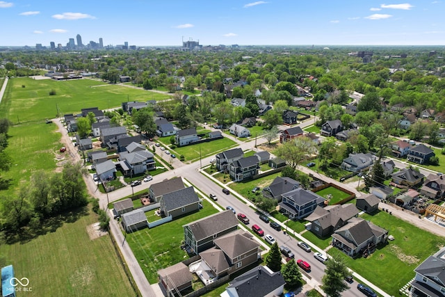 aerial perspective of suburban area featuring a view of skyline