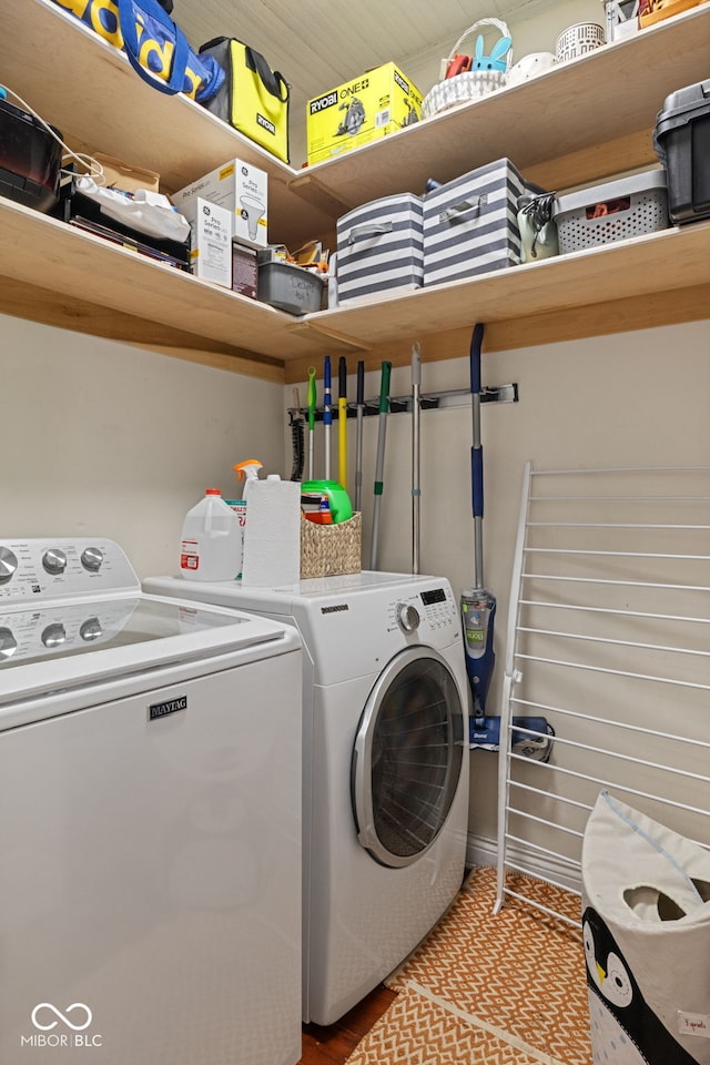 laundry room with separate washer and dryer