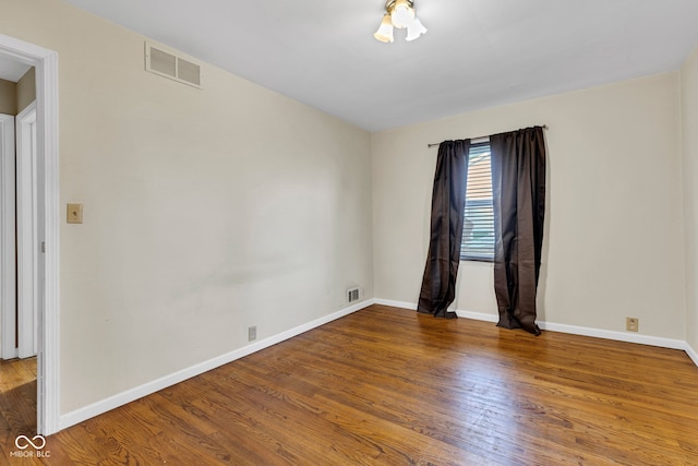 518 N Carr Rd, Plainfield, IN 46168 - spare room featuring wood finished floors and baseboards