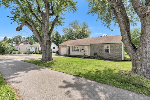 518 N Carr Rd, Plainfield, IN 46168 - view of front of home featuring stone siding, an attached garage, driveway, and a front yard
