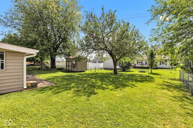 518 N Carr Rd, Plainfield, IN 46168 - view of yard featuring a shed and an outbuilding