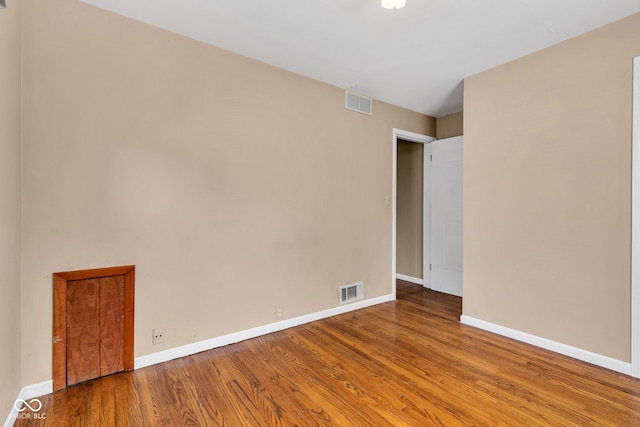 518 N Carr Rd, Plainfield, IN 46168 - spare room featuring wood finished floors and baseboards