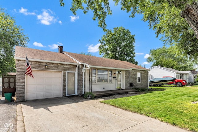 518 N Carr Rd, Plainfield, IN 46168 - single story home with a garage, concrete driveway, a front yard, stone siding, and a porch